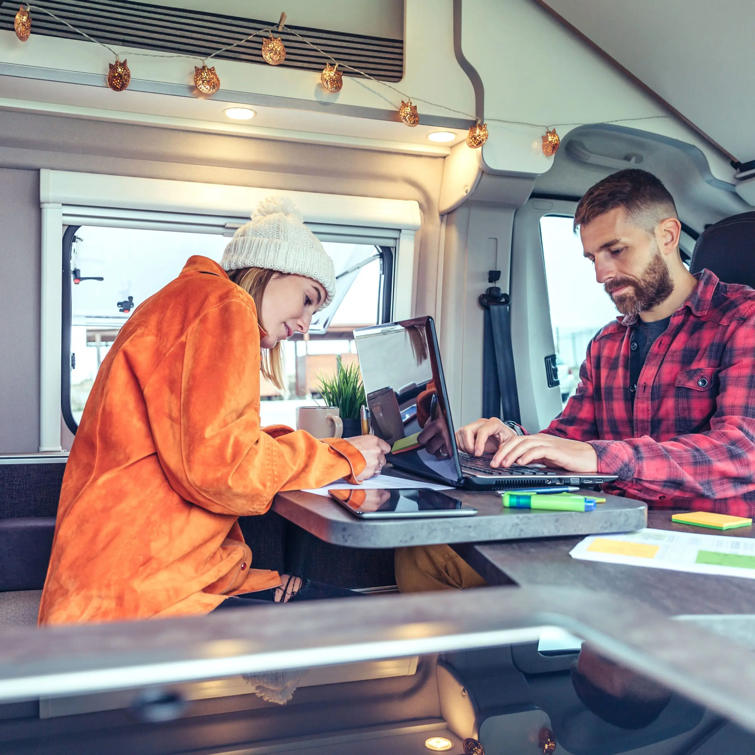 A protective barrier installed around the base of an RV to enclose the underside and act as a shield. Adding skirting is one of the most effective ways to improve insulation, conserve heat, and protect plumbing during winter camping. Skirting material can vary from insulated vinyl panels to heavy-duty fabric, to foam boards or DIY options made of plywood or corrugated plastic. Professionally made skirting can cost $1,000 to $3,000, while DIY solutions may be as low as $200 to $500. Installation and removal are straightforward, but some options may require more effort due to weight. Figure a moderate amount of storage space. – Winter family2 scaled 1 jpg